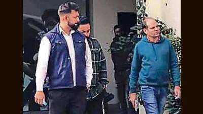 NIA officials during a raid at former LIP Khanna president Sarabjit Kang’s house in Khanna on Wednesday. (HT Photo)
