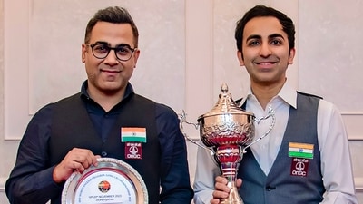 Pankaj Advani (right) and runner-up Sourav Kothari (left) pose with their respective trophies (PTI) Pankaj Advani (right) and runner-up Sourav Kothari (left) pose with their respective trophies (PTI)