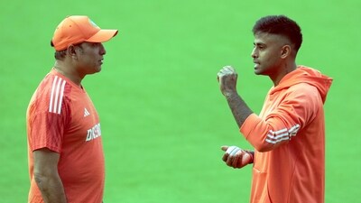 Suryakumar Yadav interacts with VVS Laxman during a practice session on the eve of the first T20 match between India and Australia (PTI) Suryakumar Yadav interacts with VVS Laxman during a practice session on the eve of the first T20 match between India and Australia (PTI)