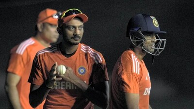 Suryakumar Yadav and Axar Patel during a practice session ahead of the first T20 between India and Australia (PTI)
