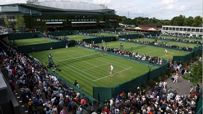 Generic view of tennis action at Wimbledon (Reuters) Generic view of tennis action at Wimbledon (Reuters)