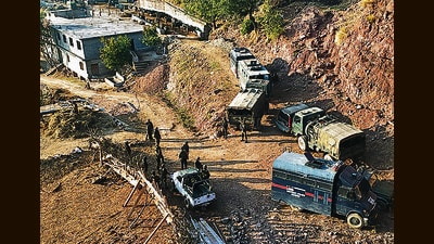 Security personnel at the site of the encounter in Jammu and Kashmir’s Rajouri district on Wednesday. (ANI) Security personnel at the site of the encounter in Jammu and Kashmir’s Rajouri district on Wednesday. (ANI)