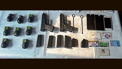 The recovered arms and ammo include two pistols, four magazines, two filler magazines and eight grenades. (ANI)