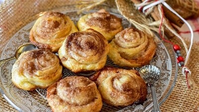 Cinnamon rolls: Adding to the spread of sweet delicacies, you can bring the fragrant and delicious cinnamon rolls to add to the party cheer. A comfort food for all seasons and occasions, cinnamon rolls are loved by one and all. You can make them by rolling out the dough, applying cinnamon-sugar mixture, and then rolling them into a log. They are then sliced, baked and drizzled with icing. (Pixabay) Cinnamon rolls: Adding to the spread of sweet delicacies, you can bring the fragrant and delicious cinnamon rolls to add to the party cheer. A comfort food for all seasons and occasions, cinnamon rolls are loved by one and all. You can make them by rolling out the dough, applying cinnamon-sugar mixture, and then rolling them into a log. They are then sliced, baked and drizzled with icing. (Pixabay)