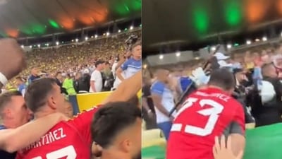 Emi Martinez tried to intervene as the local police clashed with Argentine fans. Emi Martinez tried to intervene as the local police clashed with Argentine fans.