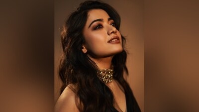 Rashmika Mandanna delighted her followers recently with pictures from a recent photoshoot. The snippets showed her in a black tissue silk saree and matching sleeveless blouse. (Instagram) Rashmika Mandanna delighted her followers recently with pictures from a recent photoshoot. The snippets showed her in a black tissue silk saree and matching sleeveless blouse. (Instagram)