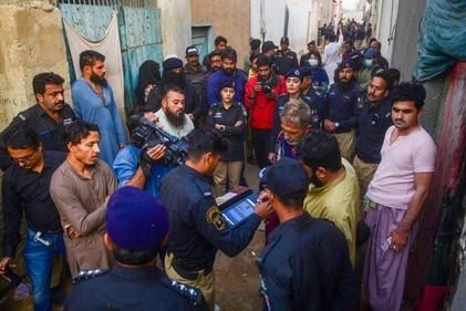 Police personnel test biometrics of Afghan refugees during a search operation to identify alleged illegal immigrants, on the outskirts of Karachi on November 17, (AFP) Police personnel test biometrics of Afghan refugees during a search operation to identify alleged illegal immigrants, on the outskirts of Karachi on November 17, (AFP)