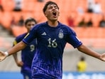 Argentina's Thiago Ezequiel Laplace celebrates scoring a goal.