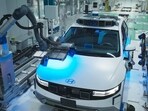 Hyundai Motor is using Boston Dynamics robots to manufacture the Ioniq 5 electric SUV at its Singapore facility. The robots, using AI technology, are contributing half of the work to manufacture the EV.