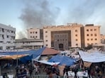 FILE PHOTO: Smoke rises as displaced Palestinians take shelter at Al Shifa hospital, amid the ongoing conflict between Hamas and Israel, in Gaza City, November 8, 2023. REUTERS/Doaa Rouqa/File Photo(REUTERS)
