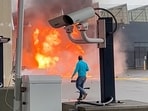 A vehicle burns at the Rainbow Bridge U.S. border crossing with Canada, in Niagara Falls, New York, U.S. November 22, 2023 in a still image from video. 