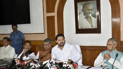 Deputy CM Tejashwi Yadav and other ministers address a press conference in Patna on Thursday. (HT Photo)