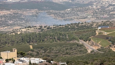Smoke billows from an area targetted in a rocket strike by Lebanese Shiite Hezbollah militants on November 23, 2023, near Israel's border with Lebanon amid increasing cross-border tensions as fighting continues with Hamas militants in the southern Gaza Strip. (Photo by jalaa marey / AFP) (AFP) Smoke billows from an area targetted in a rocket strike by Lebanese Shiite Hezbollah militants on November 23, 2023, near Israel's border with Lebanon amid increasing cross-border tensions as fighting continues with Hamas militants in the southern Gaza Strip. (Photo by jalaa marey / AFP) (AFP)