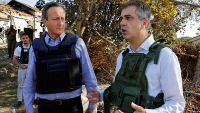 British Foreign Secretary David Cameron and Israeli Foreign Minister Eli Cohen visit Kibbutz Beeri following the October 7 deadly attack by Palestinian Islamist group Hamas, in southern Israel, November 23, 2023. REUTERS/Alexander Ermochenko (REUTERS)