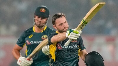 Australia got off to a quick start thanks to Steve Smith but while he was later curtailed, Josh Inglis upped the ante. He ended up racing past his first T20I half-century and converted that into a century in just 47 balls, equalling Aaron Finch's record for fastest T20I ton by an Australian. (AP) Australia got off to a quick start thanks to Steve Smith but while he was later curtailed, Josh Inglis upped the ante. He ended up racing past his first T20I half-century and converted that into a century in just 47 balls, equalling Aaron Finch's record for fastest T20I ton by an Australian. (AP)