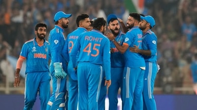 India's Virat Kohli, third right, celebrates with teammates after taking the catch to dismiss Australia's David Warner during the ICC Men's Cricket World Cup final match (AP) India's Virat Kohli, third right, celebrates with teammates after taking the catch to dismiss Australia's David Warner during the ICC Men's Cricket World Cup final match (AP)