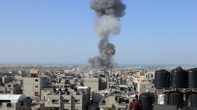 Smoke billows after an Israeli strike on Rafah, in the southern Gaza Strip on November 23, 2023, amid continuing battles between Israel and the Palestinian militant group Hamas. (AFP) Smoke billows after an Israeli strike on Rafah, in the southern Gaza Strip on November 23, 2023, amid continuing battles between Israel and the Palestinian militant group Hamas. (AFP)