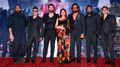 Actors Ranbir Kapoor, Rashmika Mandanna and Bobby Deol, director Sandeep Reddy Vanga, managing director of T-Series Bhushan Kumar and others at the trailer launch of their upcoming film Animal in New Delhi on Thursday. The men were all dressed in black semi-formal looks. (PTI) Actors Ranbir Kapoor, Rashmika Mandanna and Bobby Deol, director Sandeep Reddy Vanga, managing director of T-Series Bhushan Kumar and others at the trailer launch of their upcoming film Animal in New Delhi on Thursday. The men were all dressed in black semi-formal looks. (PTI)