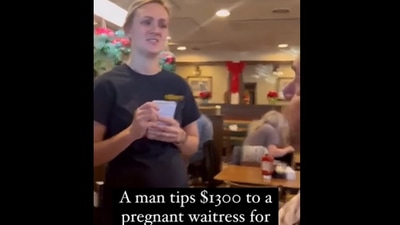 Snapshot of the woman getting the tip at the restaurant. Snapshot of the woman getting the tip at the restaurant.