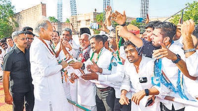 Rajasthan chief minister Ashok Gehlot greets supporters at Piparcity, in Jodhpur district, on Wednesday. (PTI) Rajasthan chief minister Ashok Gehlot greets supporters at Piparcity, in Jodhpur district, on Wednesday. (PTI)