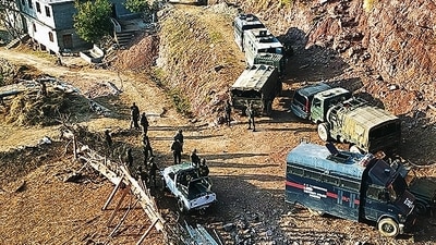 Security personnel at the site of the encounter in Jammu and Kashmir’s Rajouri district on Wednesday. (ANI) Security personnel at the site of the encounter in Jammu and Kashmir’s Rajouri district on Wednesday. (ANI)