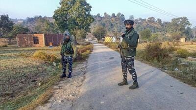 Security personnel standing guard during an encounter with terrorists in the Baji Maal area of Rajouri district on Thursday. (PTI Photo) Security personnel standing guard during an encounter with terrorists in the Baji Maal area of Rajouri district on Thursday. (PTI Photo)