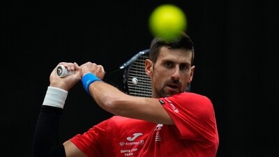 Serbia's Novak Djokovic practices during a training session of the Davis Cup in Malaga, Spain (AP) Serbia's Novak Djokovic practices during a training session of the Davis Cup in Malaga, Spain (AP)