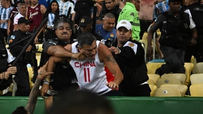 Fans of Argentina clash with Brazilian police before the start of the 2026 FIFA World Cup South American qualification football match between Brazil and Argentina at Maracana Stadium (AFP) Fans of Argentina clash with Brazilian police before the start of the 2026 FIFA World Cup South American qualification football match between Brazil and Argentina at Maracana Stadium (AFP)
