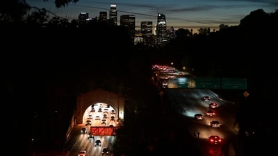 The Downtown Los Angeles skyline is seen as motorists make their way in and out of Los Angeles on November 22, 2023 as millions of people head to their Thanksgiving destinations. (Photo by Frederic J. BROWN / AFP) (AFP) The Downtown Los Angeles skyline is seen as motorists make their way in and out of Los Angeles on November 22, 2023 as millions of people head to their Thanksgiving destinations. (Photo by Frederic J. BROWN / AFP) (AFP)