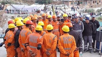 Until each worker is evacuated through the pipe, a team of NDRF personnel will remain on the other side. (HT Photo) Until each worker is evacuated through the pipe, a team of NDRF personnel will remain on the other side. (HT Photo)
