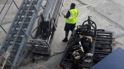 American Airlines staff mishandling a passenger’s wheelchair. (X/@DefectiveBecca) American Airlines staff mishandling a passenger’s wheelchair. (X/@DefectiveBecca)