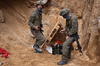 Israeli soldiers operate at the opening of a tunnel at Al Shifa Hospital compound in Gaza City. (Reuters)