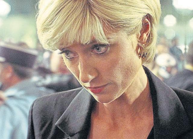 Elizabeth Debicki cocks her head sideways and looks up shyly to mimic Princess Diana. Elizabeth Debicki cocks her head sideways and looks up shyly to mimic Princess Diana.