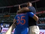 Rinku Singh and Abhishek Nayar hug after India's win. Rinku Singh and Abhishek Nayar hug after India's win.
