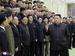 North Korea's leader Kim Jong-un meets with members of the Non-Standing Satellite Launch Preparation Committee. (Reuters)