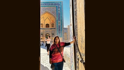 ‘Everywhere we went, we were welcomed with warmth as travellers from “Hindustan”. In Samarkand, we came across an Uzbek businessman who spoke fluent Hindi. On the train back to Tashkent, there was a talent contest based on Madhuri Dixit, with young Uzbeks dancing to Hindi songs,’ says Aparna Piramal Raje, seen above at a mosque in Bukhara. ‘Everywhere we went, we were welcomed with warmth as travellers from “Hindustan”. In Samarkand, we came across an Uzbek businessman who spoke fluent Hindi. On the train back to Tashkent, there was a talent contest based on Madhuri Dixit, with young Uzbeks dancing to Hindi songs,’ says Aparna Piramal Raje, seen above at a mosque in Bukhara.