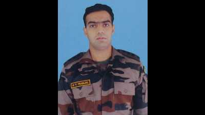 Captain Pranjal, who led a search party, faced heavy fire as he came out from his security cover to help trapped women and children flee to safety. (HT Photo) Captain Pranjal, who led a search party, faced heavy fire as he came out from his security cover to help trapped women and children flee to safety. (HT Photo)
