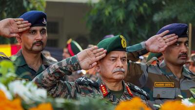General officer commanding-in-chief of Northern Command Lt General Upendra Dwivedi paying homage to martyrs of the encounter with terrorists in Rajouri district, during a wreath-laying ceremony in Jammu on Friday. (PTI Photo) General officer commanding-in-chief of Northern Command Lt General Upendra Dwivedi paying homage to martyrs of the encounter with terrorists in Rajouri district, during a wreath-laying ceremony in Jammu on Friday. (PTI Photo)