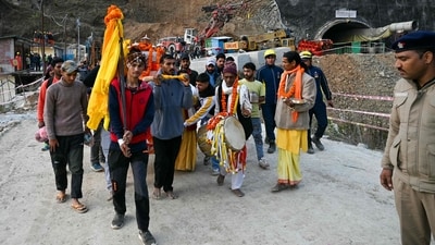 Locals worship deity 'Boukhnag' days after the under construction Silkyara tunnel collapsed in the Uttarkashi district of India's Uttarakhand state, on November 23. (AFP)