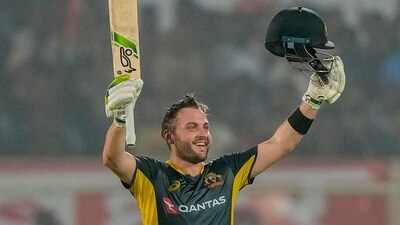 Josh Inglis celebrates after scoring a century during the first T20 cricket match between India and Australia. (AP) Josh Inglis celebrates after scoring a century during the first T20 cricket match between India and Australia. (AP)