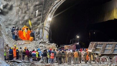 Uttarkashi: Locals carrying a deity on a palanquin offer prayers at the Silkyara Tunnel's entrance during the rescue operation of 41 workers trapped inside the tunnel. (PTI) Uttarkashi: Locals carrying a deity on a palanquin offer prayers at the Silkyara Tunnel's entrance during the rescue operation of 41 workers trapped inside the tunnel. (PTI)