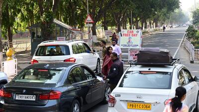 Panjab University security staff stopping cars at the varsity’s gate number 3. (Ravi Kumar/HiT)