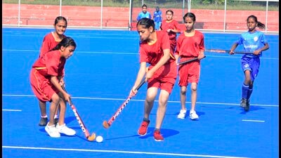 Players from Mundian Kalan and Rampur teams in action during the District Hockey Championship in Ludhiana. (HT PHOTO) Players from Mundian Kalan and Rampur teams in action during the District Hockey Championship in Ludhiana. (HT PHOTO)
