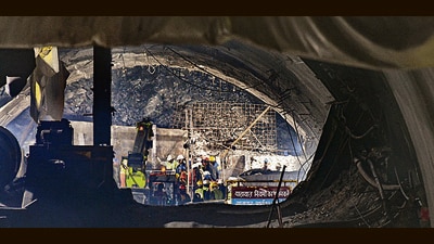 Rescue operations in progress at the tunnel in Silkyara, Uttarkashi, on Friday. (PTI) Rescue operations in progress at the tunnel in Silkyara, Uttarkashi, on Friday. (PTI)