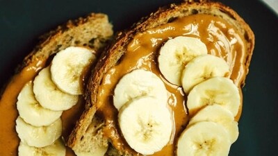 Smart bedtime snacks: If needed, have a light, balanced snacklike banana with almond butter to curb late-night cravings. (Pinterest) Smart bedtime snacks: If needed, have a light, balanced snacklike banana with almond butter to curb late-night cravings. (Pinterest)