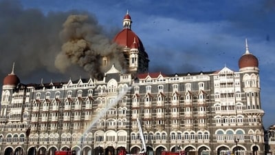 26/11 - Mumbai Under Terror Attack - Firing - Fire at Taj Hotel - Fire brigade officers fighting with fire at Taj hotel - HT photo by Hemant Padalkar. 27.11.08 (Hindustan Times)