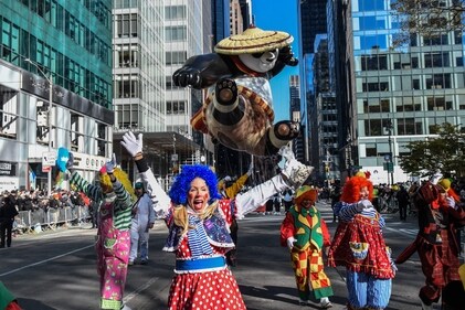 People participate in Macy's annual Thanksgiving Day Parade on November 23, 2023 in New York City. Thousands of people lined the streets to watch the 25 balloons and hundreds of performers march in this parade happening since 1924. (Photo by STEPHANIE KEITH / GETTY IMAGES NORTH AMERICA / Getty Images via AFP)