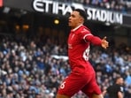 Liverpool's Trent Alexander-Arnold celebrates after scoring his side's opening goal during the English Premier League soccer match between Manchester City and Liverpool Liverpool's Trent Alexander-Arnold celebrates after scoring his side's opening goal during the English Premier League soccer match between Manchester City and Liverpool