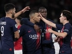 Paris Saint-Germain's French forward #07 Kylian Mbappe (CL) is congratulated by Goncalo Ramos (L), Vitinha (R) after scoring PSG's second goal Paris Saint-Germain's French forward #07 Kylian Mbappe (CL) is congratulated by Goncalo Ramos (L), Vitinha (R) after scoring PSG's second goal