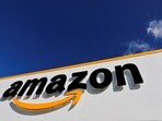 FILE PHOTO: The logo of Amazon is seen at the company's logistics centre in Boves, France, October 6, 2021 REUTERS/Pascal Rossignol/File Photo